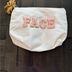 White Pouch with Pink FACE Embroidery
